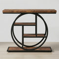 Industrial console table with a rustic brown wood top and shelves, supported by a black metal circular frame and base, shown against a neutral light gray background.