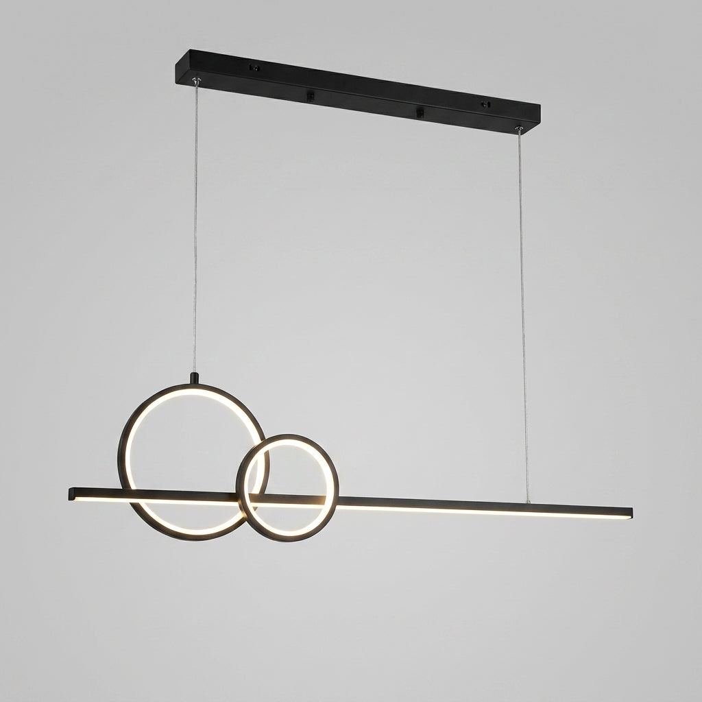 Modern linear LED pendant light with two interlocking circular ring elements, suspended from a rectangular ceiling mount against a light gray background.