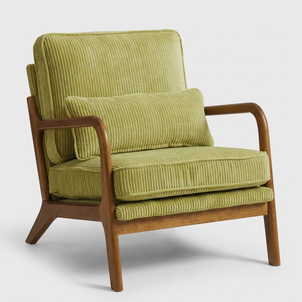 A mid-century modern accent chair featuring olive green ribbed corduroy upholstery and a warm medium-brown wooden frame, shown against a light gray studio background.