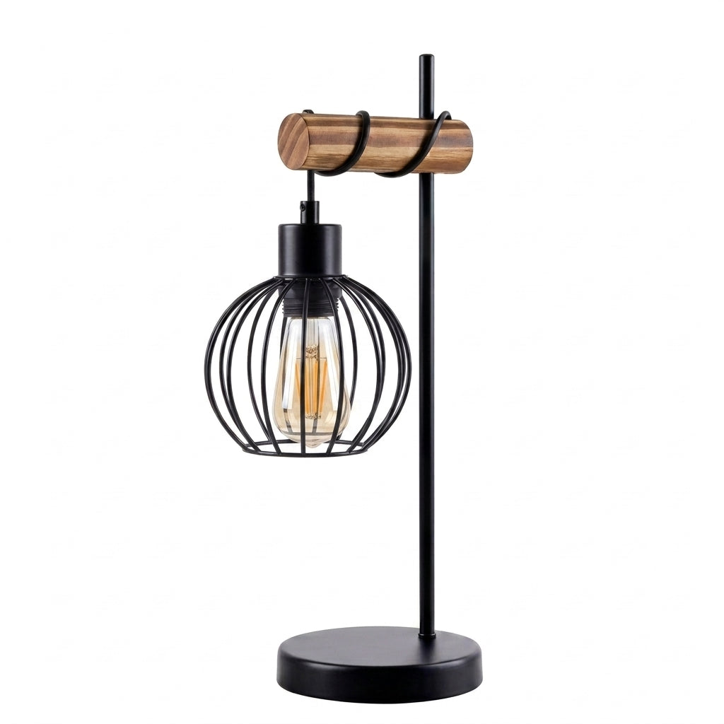 A modern industrial-style table lamp with a black metal wire cage shade, clear bulb, vertical stand, and a horizontal wooden accent bar, shown on a plain white background.