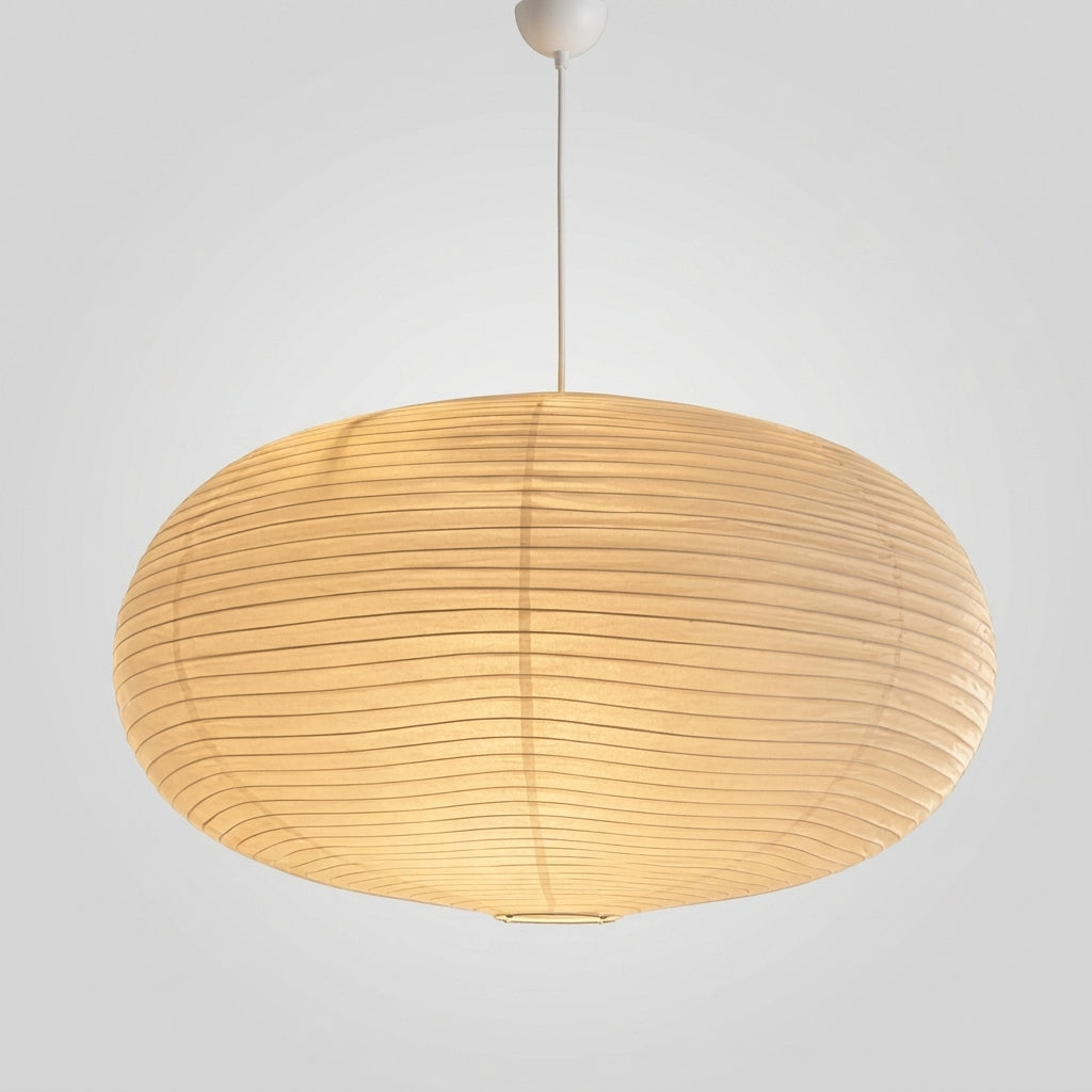 A modern oval pendant light with a pleated, ribbed paper or fabric shade, glowing with a warm yellow light against a neutral light gray background.